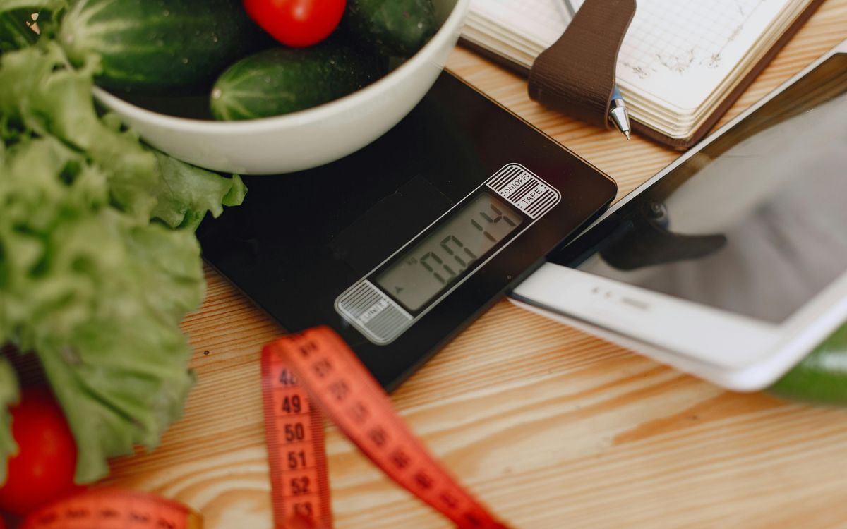 Flour being weighed on a small digital kitchen scale