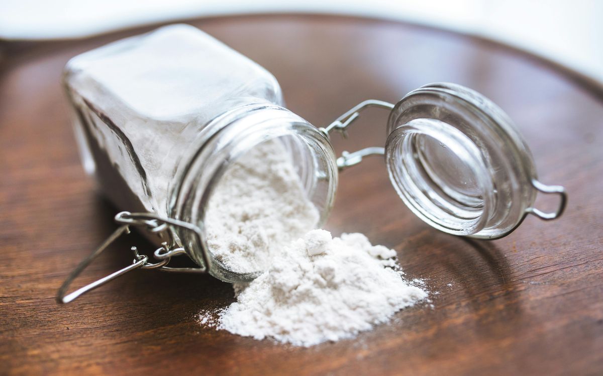 Flour, sugar, and baking ingredients on a counter