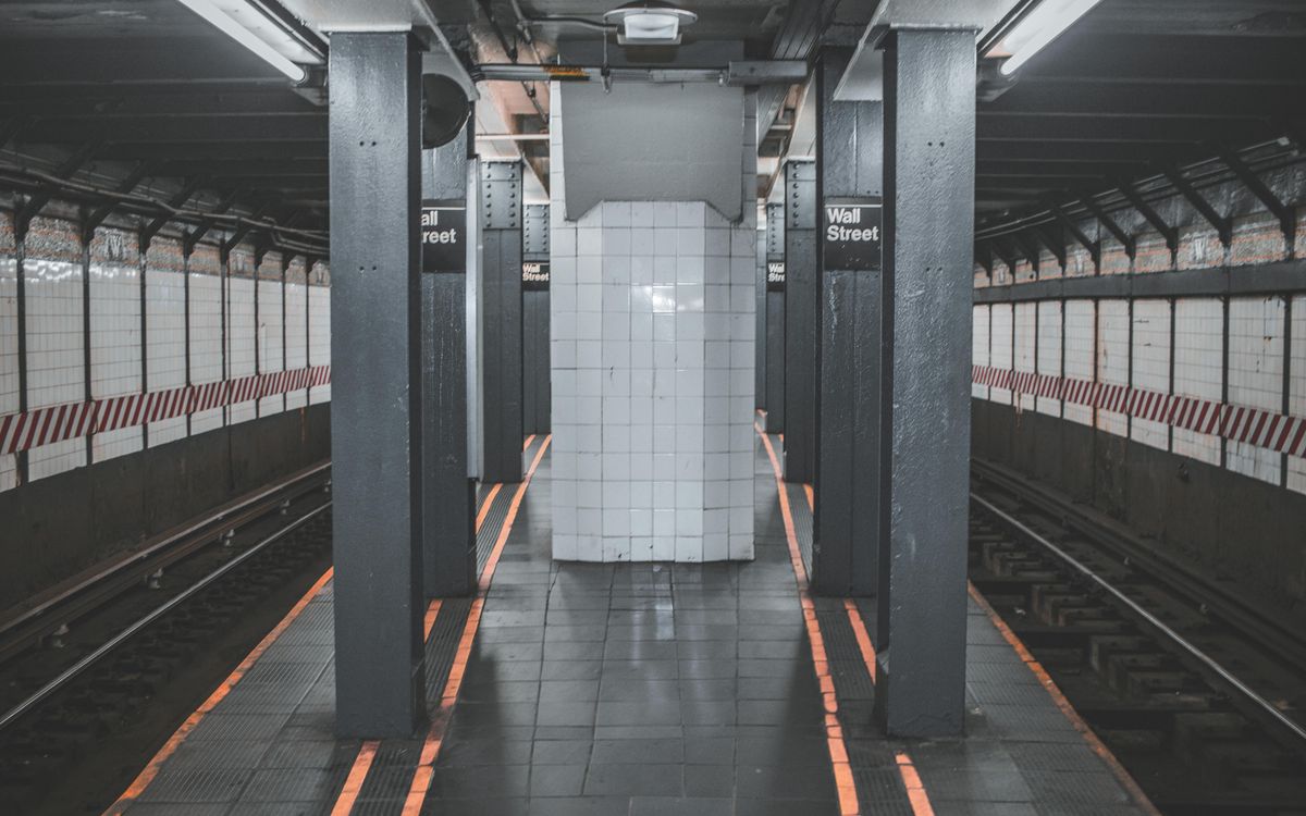 An empty subway platform late at night